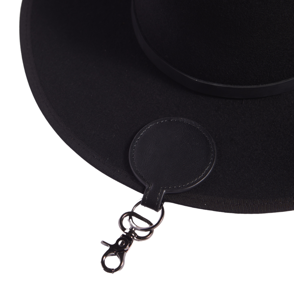 Introducing the Black Magnetic Leather Clip Hat Holder, a sleek and practical accessory designed to keep your hats secure and stylish. Crafted with a magnetic closure, this holder ensures your hats stay in place while adding a touch of sophistication with its leather finish. A must-have accessory for hat enthusiasts, this item combines functionality with a classic design.