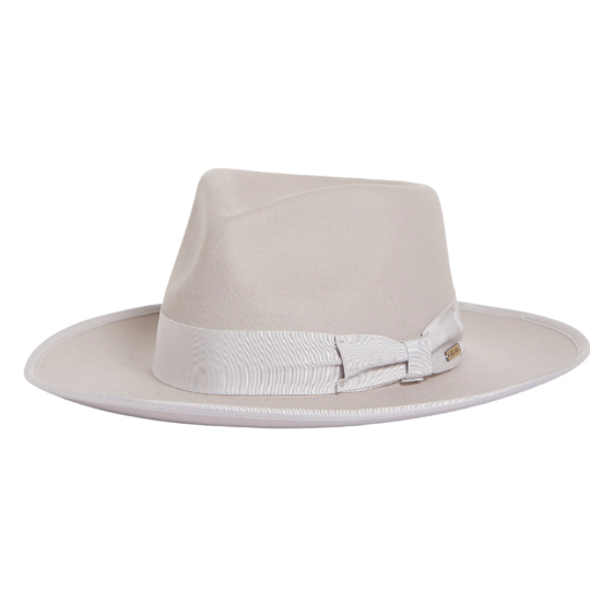 Introducing the Ivory Short Brim Fedora with Band, a stylish and versatile accessory for your fashion collection. This elegant fedora features a shorter brim and a chic band, adding a touch of class to any ensemble. With its timeless design, it's the ideal choice to enhance your style and make a statement on any occasion.